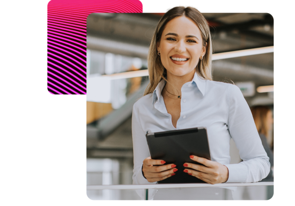 A lady smiling holding a tablet.