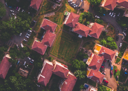 Aerial view of the rooftops of lots of houses