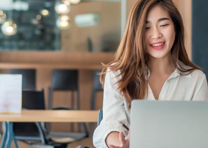 Woman on laptop at work