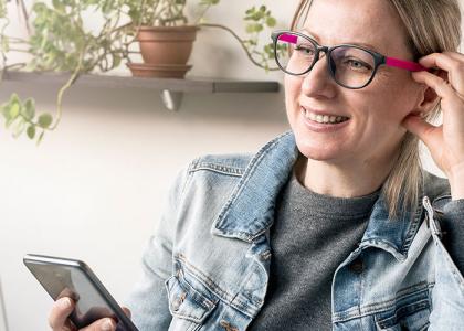 Lady looking happy as part of a remote workforce