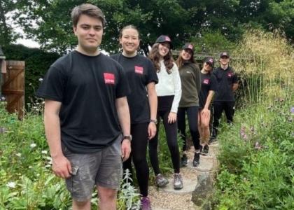 Group of staff in a garden