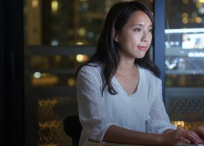 Woman using a computer in an office
