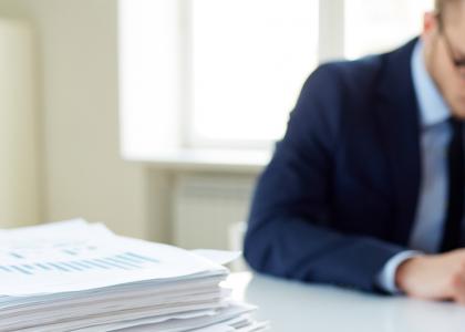 Man stressed about paperwork