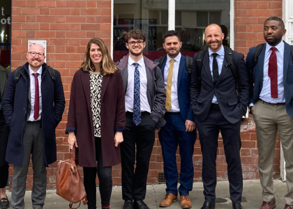 MHR's UX team stood in front of the My Sight Nottingham building