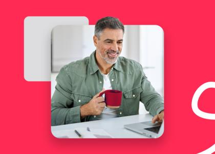 A man sitting on a laptop. with a red background and MHR swish.