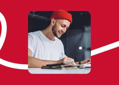 A man working from home with a tablet and digital pen.