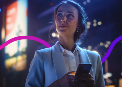 Image of a woman holding an iPad. 