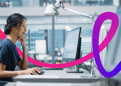 woman working on a desktop computer