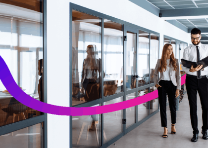 3 people walking in an office