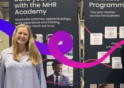 Three MHR graduates at a university careers fair