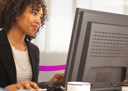 woman in an office using a computer