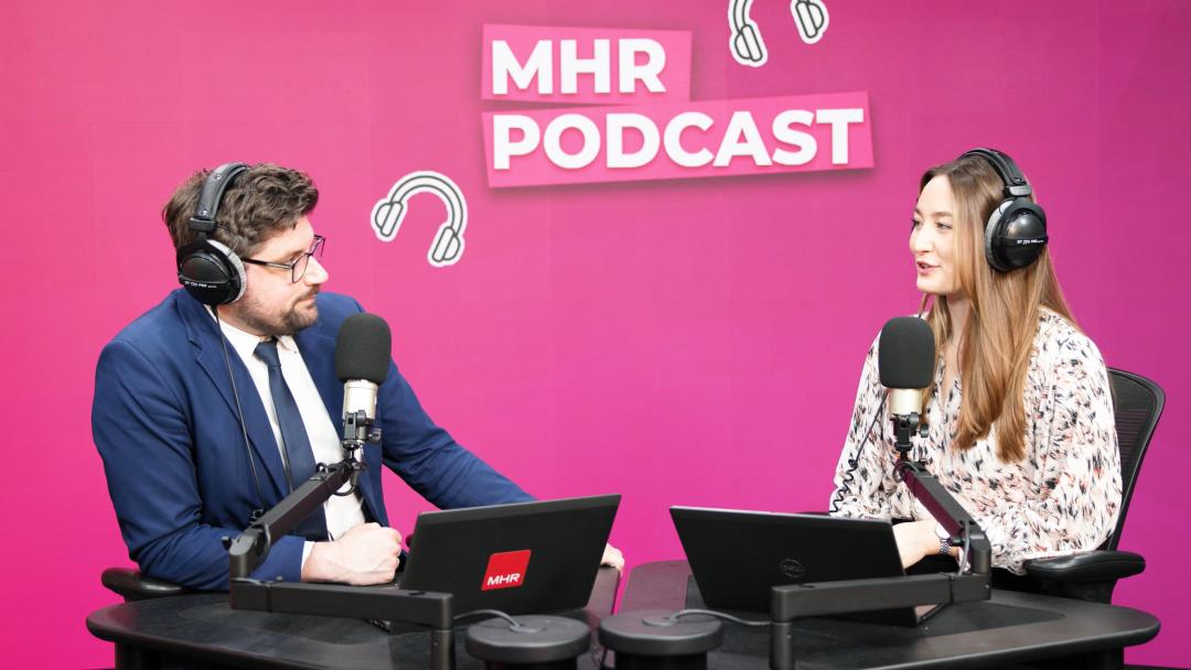 Andy and Alice sat with MHR podcast displaying behind them.