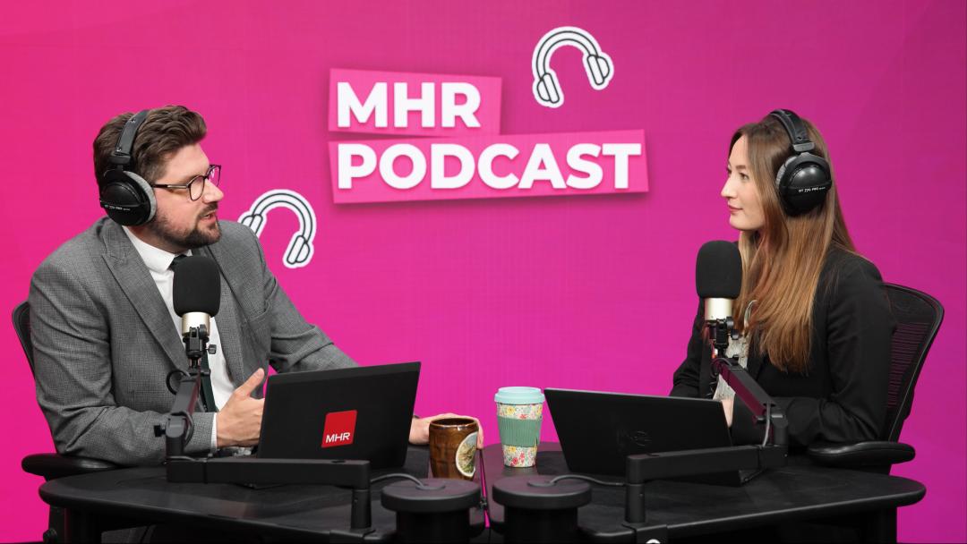 Andy and Alice sat with MHR podcast displaying behind them.