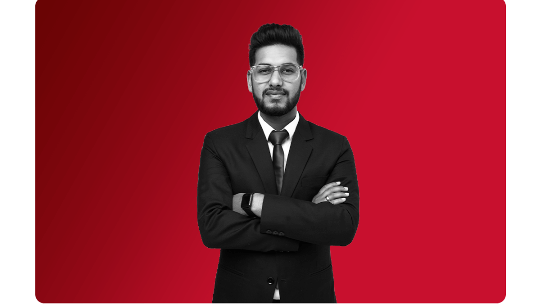 a man in a suit wearing glasses, happy with the cultural transformation hr software has given him.