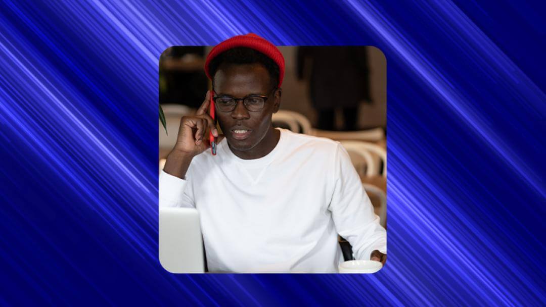 Image of a man making a phone call. 