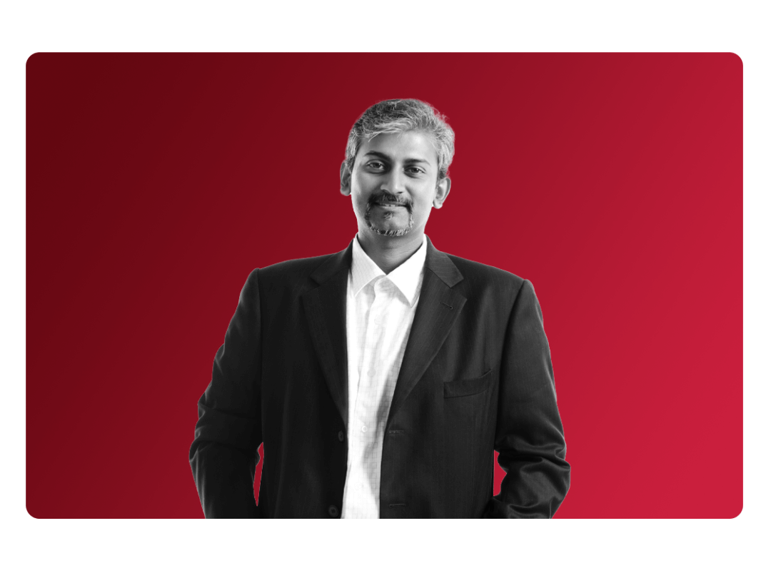 Man smiling whilst his systems seamlessly integrate together allowing him to work smarter.
