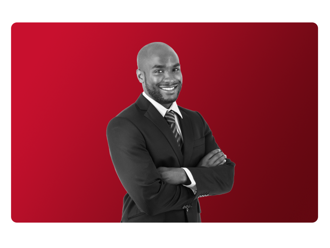 a man smiling with his arms crossed, happy after driving sustainable growth with MHR's ESG software.