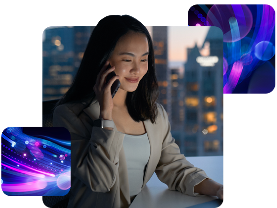 a lady on the phone, smiling after implementing MHR's finance solutions with Microsoft.