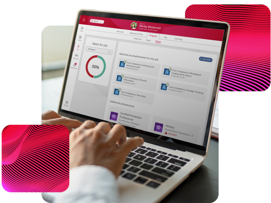 An employee sat at a laptop reviewing their Progress within People First Talent Management software