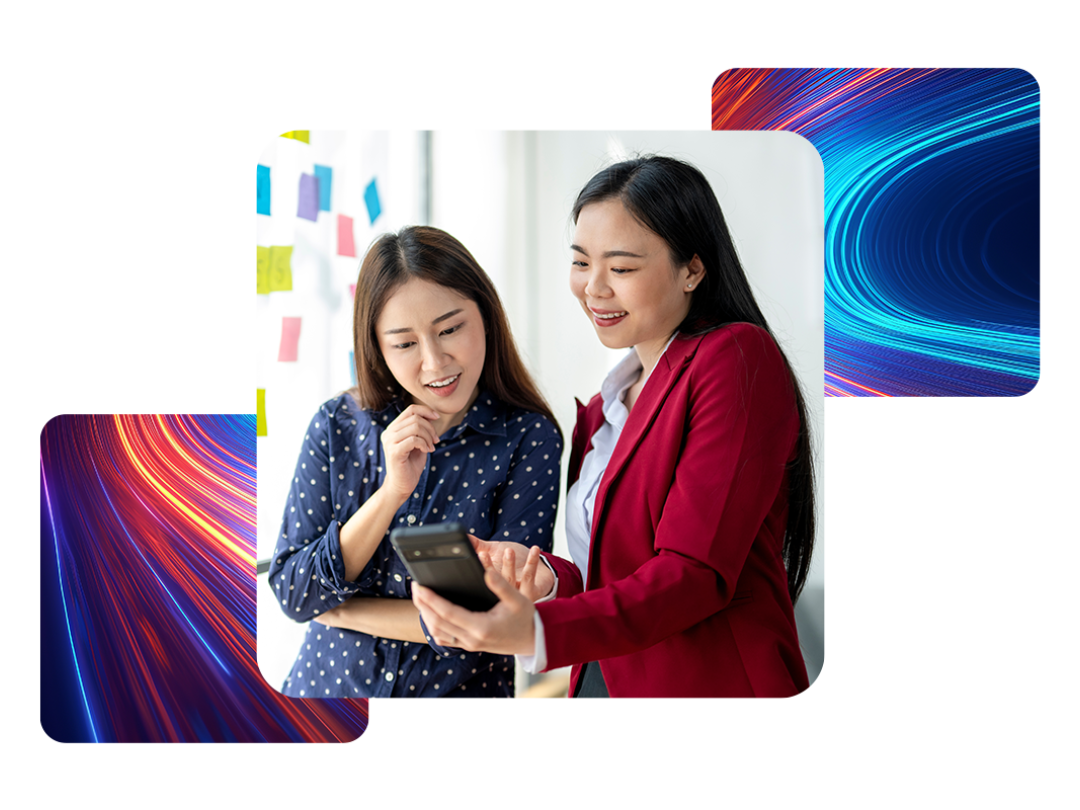 Two woman looking at a mobile.