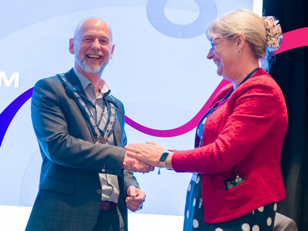 Two people shaking hands