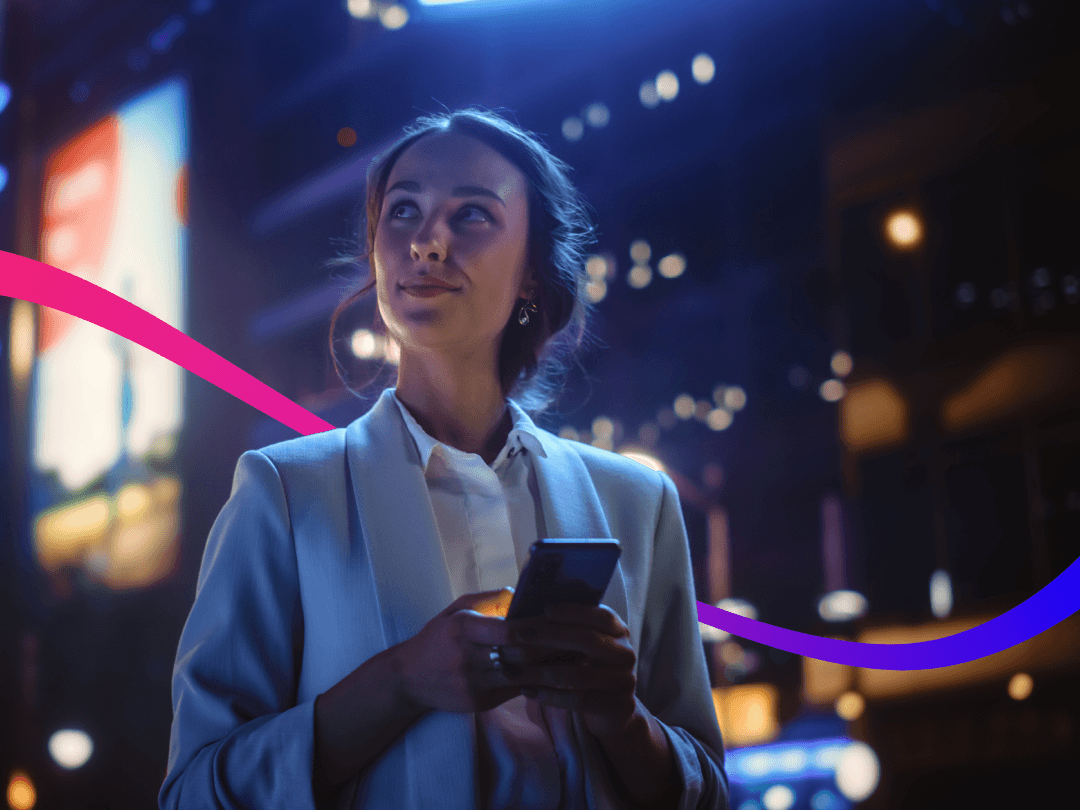 Person on phone looking into the distance