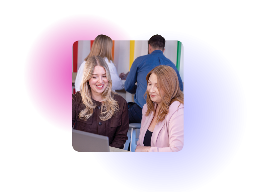 Two business women viewing a computer screen
