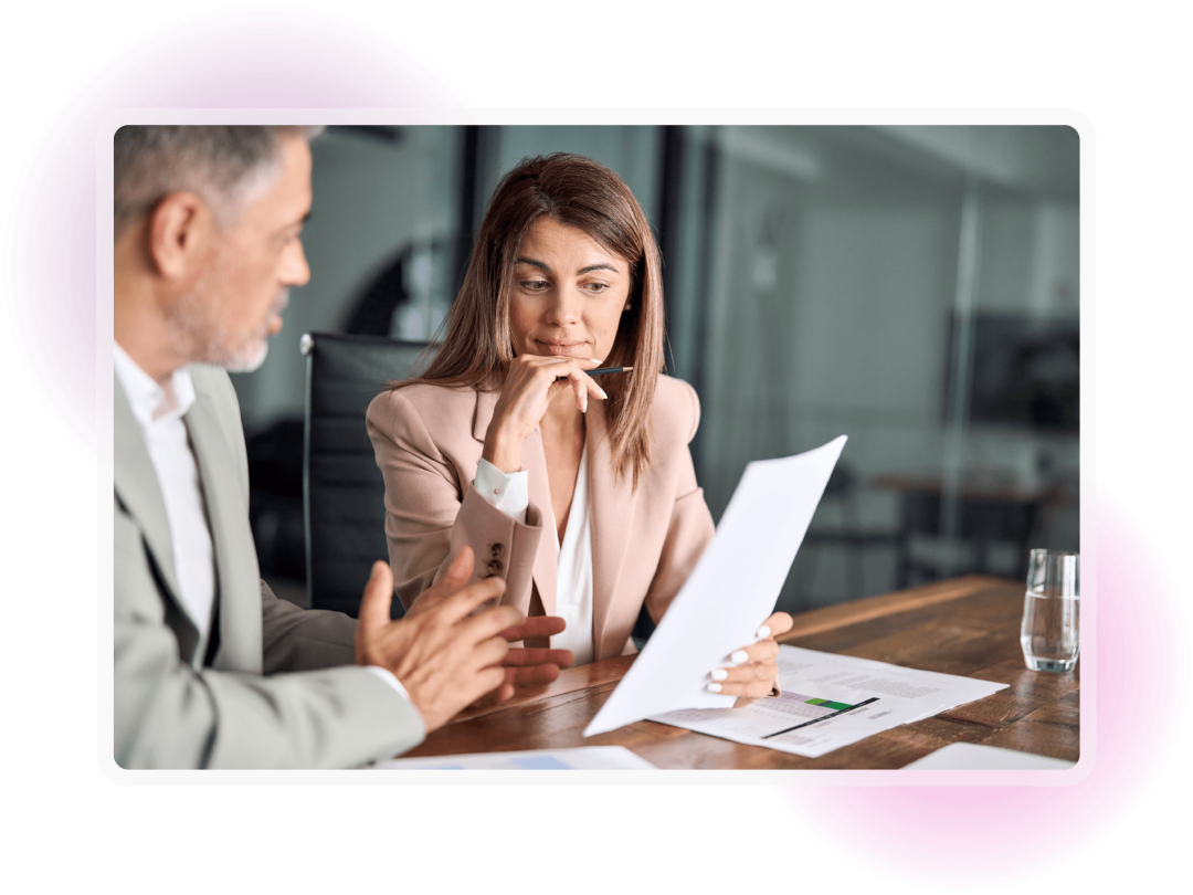 Professionals reviewing financial planning and business performance data