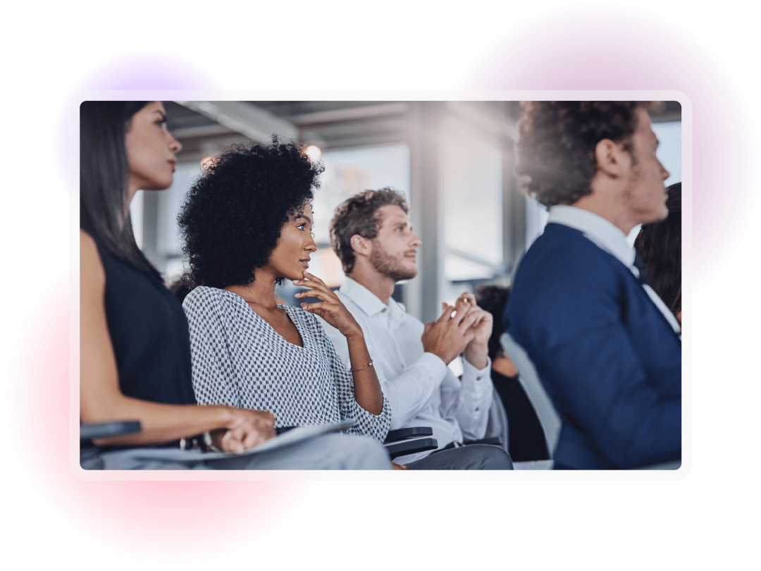 Employees attending a professional development and training session