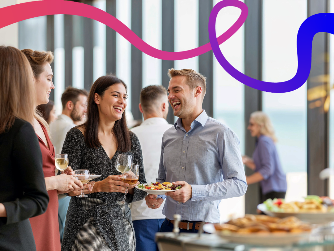 A group of work colleagues  with wine and food