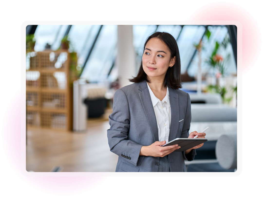Professional using a tablet in a modern workplace