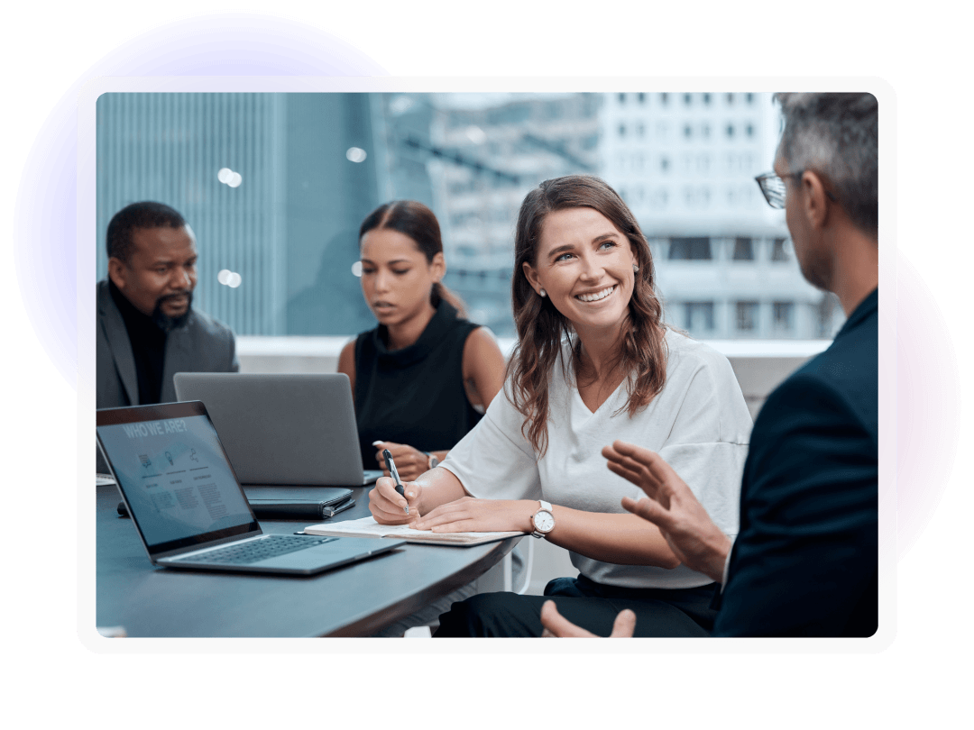 Colleagues collaborating around a table during a business meeting