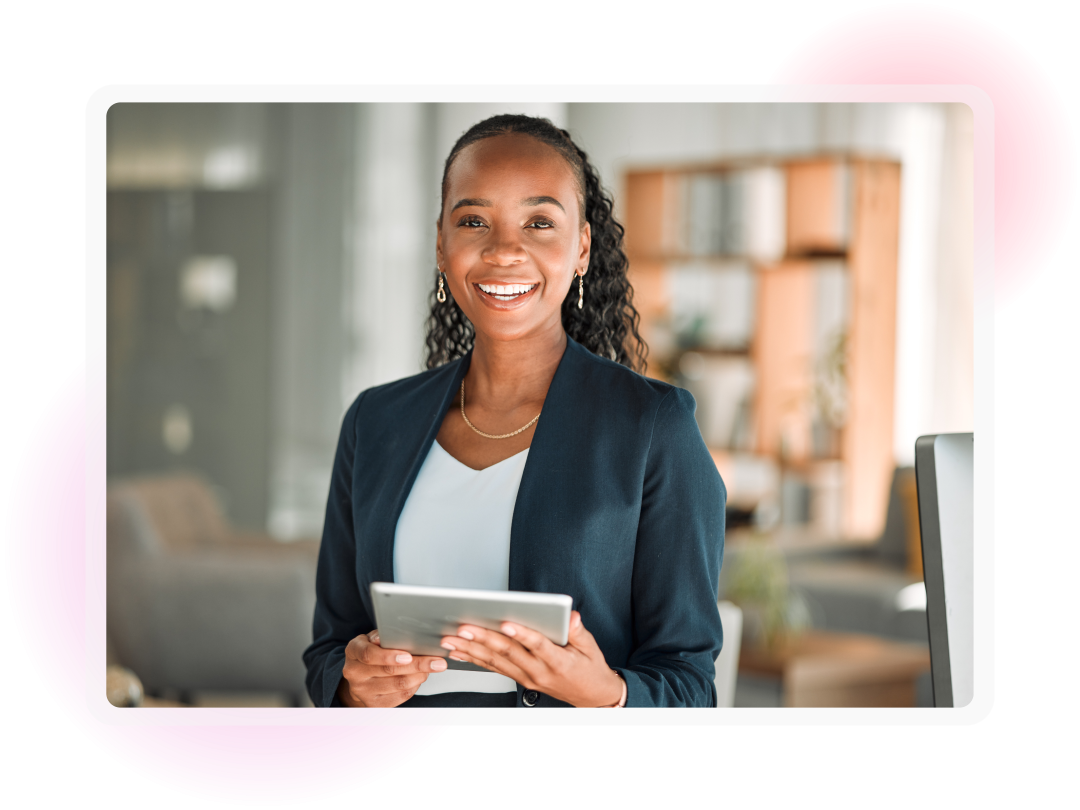 Business professional holding a tablet in an office