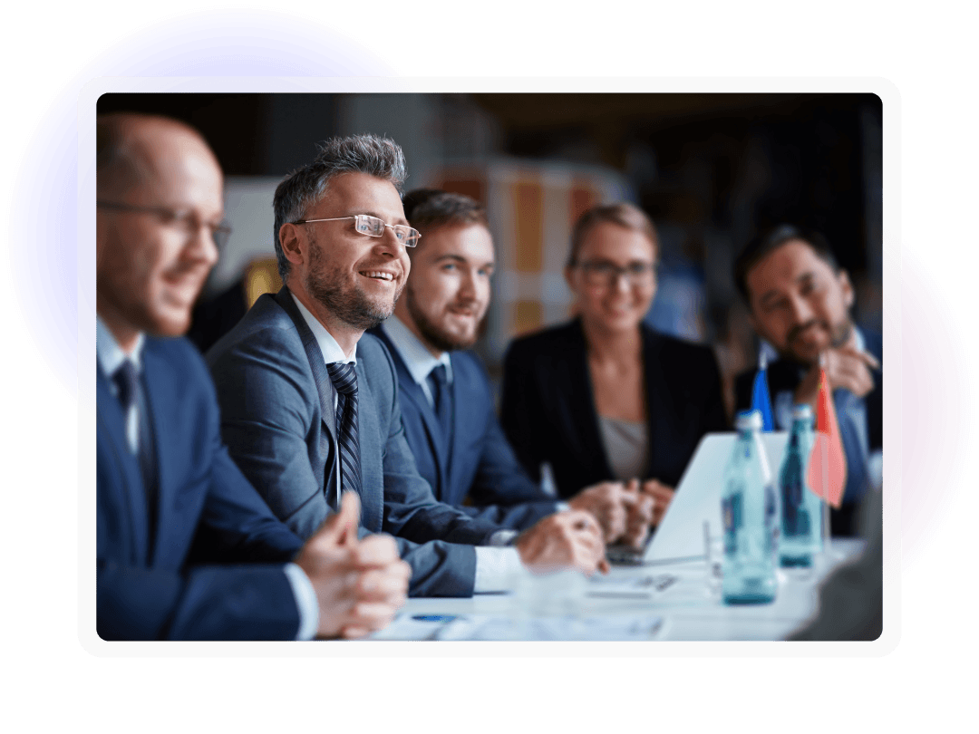 Business professionals meeting around a conference table
