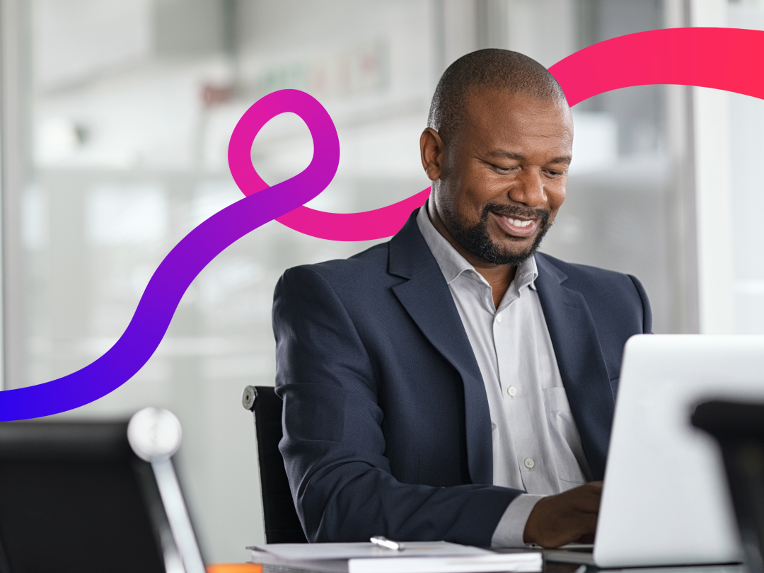 Man at his desk on a laptop