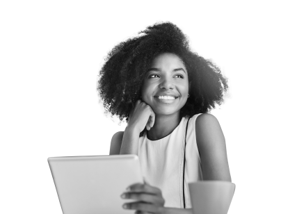 a lady with her hand under her chin, smiling holding a tablet.